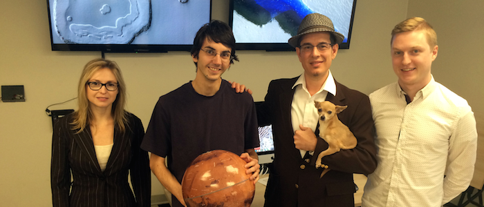 The Western-bean team planning HiRISE operations: Christy Caudill, Eric Pilles, Dr. Livio Tornabene, and Ian Pritchard (left to right).