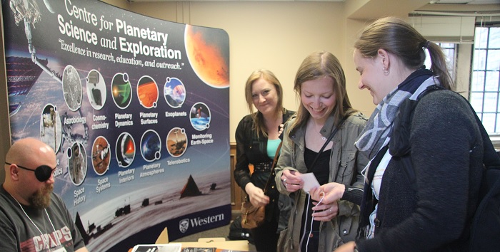 Investigating samples at the Monday evening ice breaker.